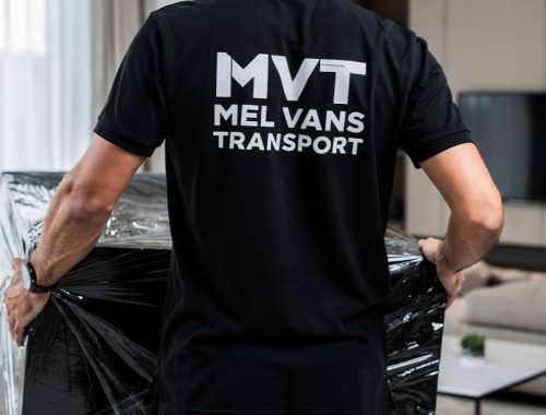 back-view-of-a-man-wearing-a-black-polo-shirt-with